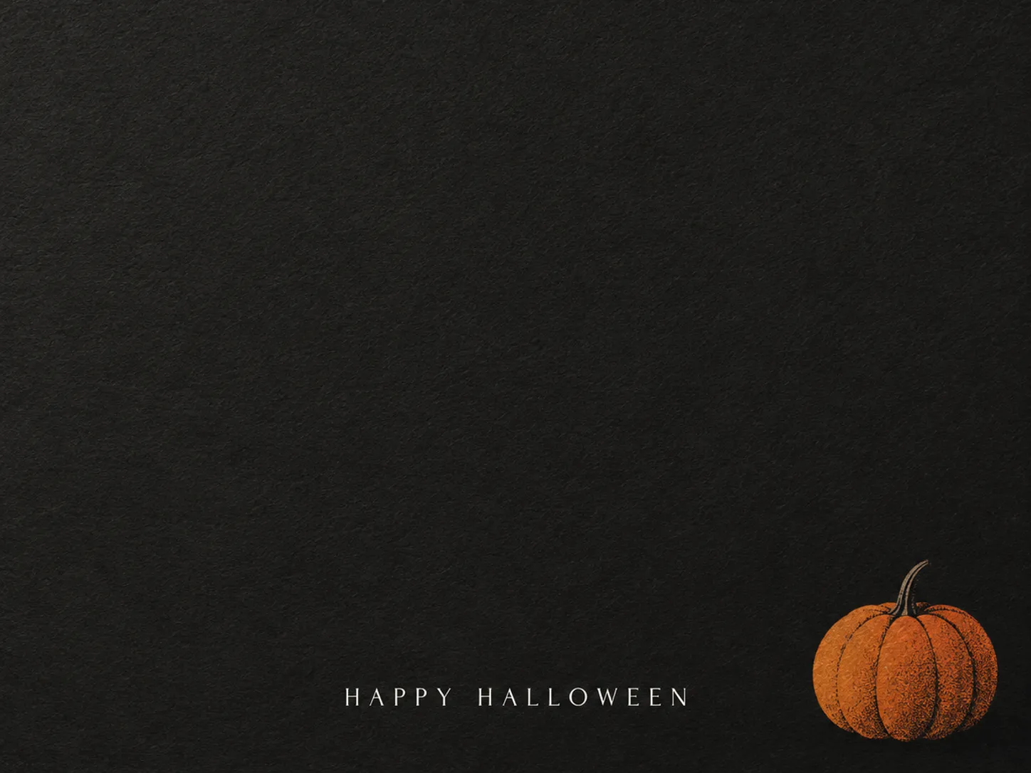 Minimal Halloween greeting card with an orange pumpkin illustration