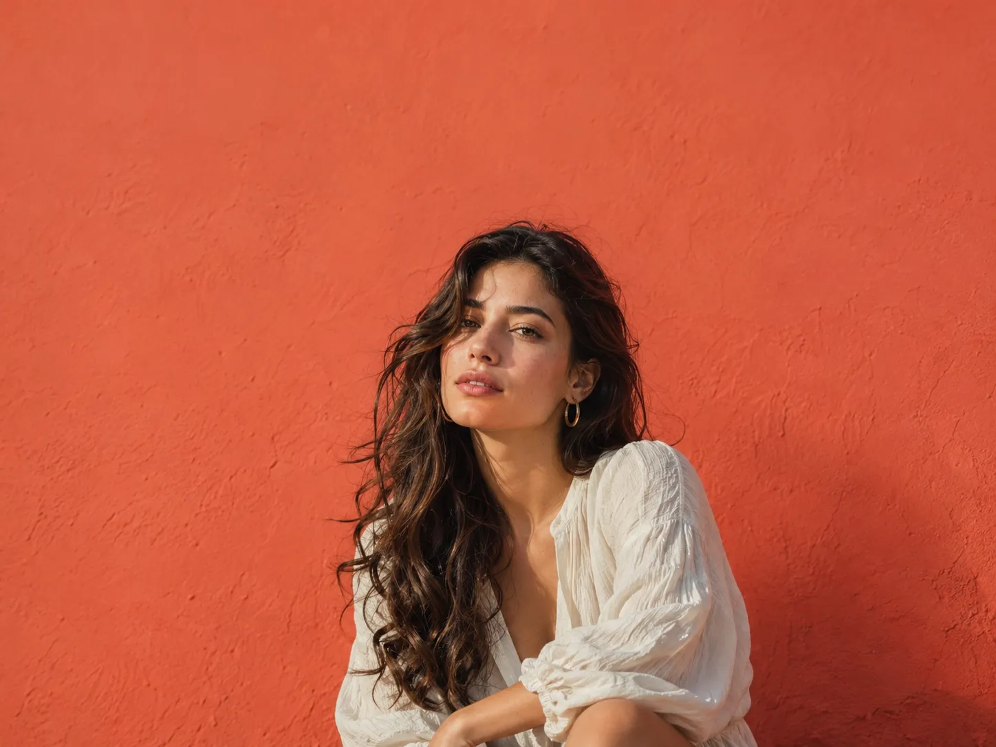 Reels cover image of a person against a coral wall