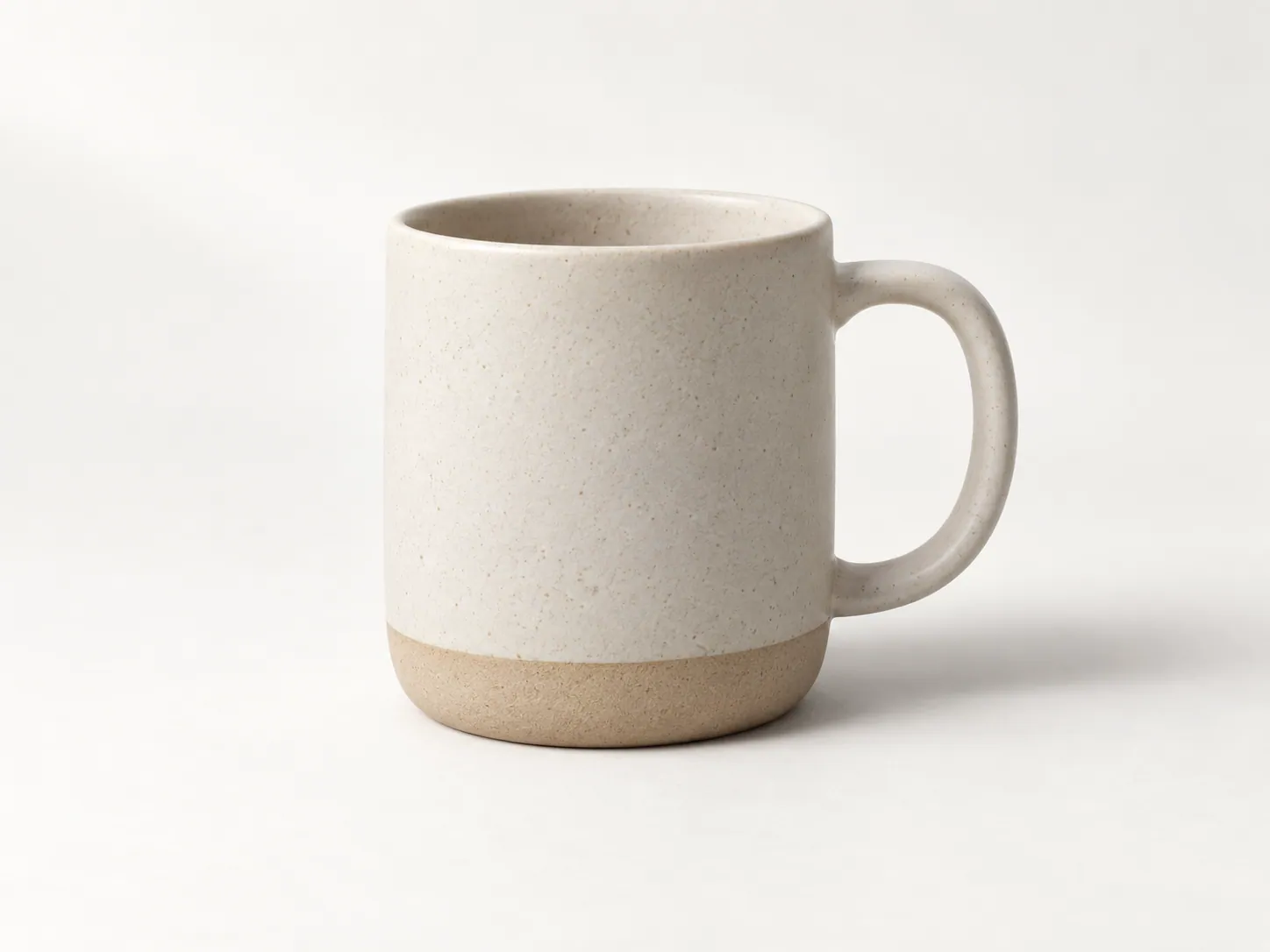 Minimal studio product shot of a matte ceramic mug